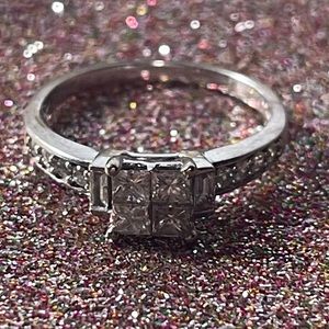 10K white gold ring with 1 carat total.